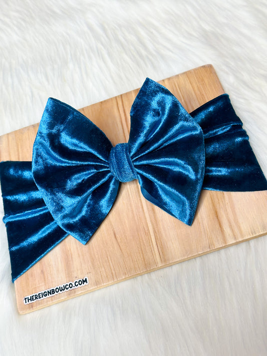 peacock blue crushed velvet bows