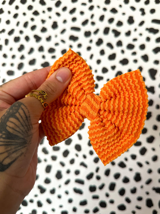 orange waved rib knit bows